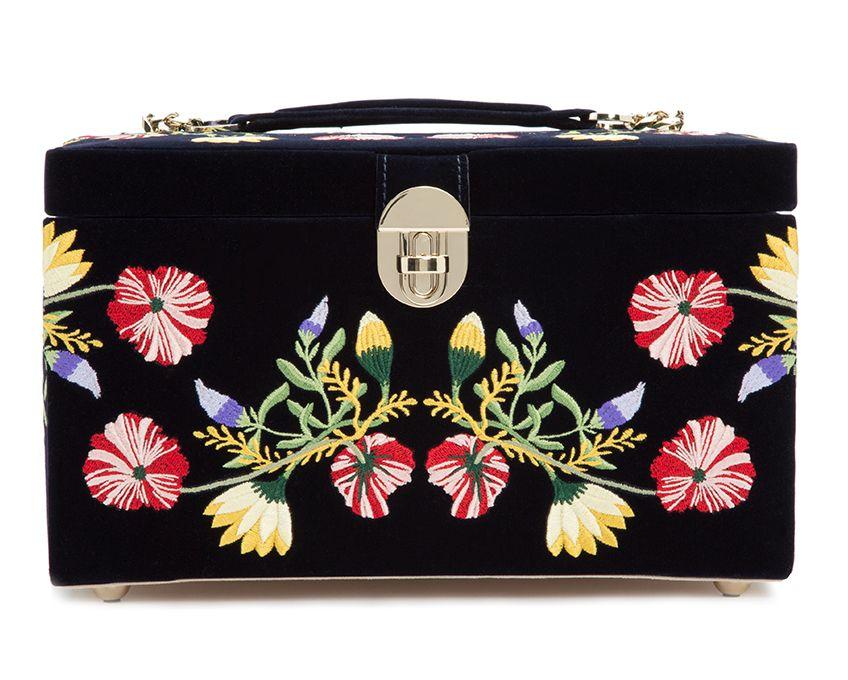 
Single Stone's Medium zoe jewelry case  featuring Velvet jewelry case embroidered with classic floral designs. Jewelry case includes a total of 10 compartments.  4 medium compartments, 3 large compartments, 4 bracelet compartments, 4 bracelet/watch cuffs, and removable mini travel piece.

LusterLoc™: Allows the fabric lining the inside of your jewelry cases to absorb the hostile gases known to cause tarnishing. Under typical storage conditions, it can prevent tarnishing for up to 35 years.

Case measurements  11.25" L X 8.5" W X 7.75" H
