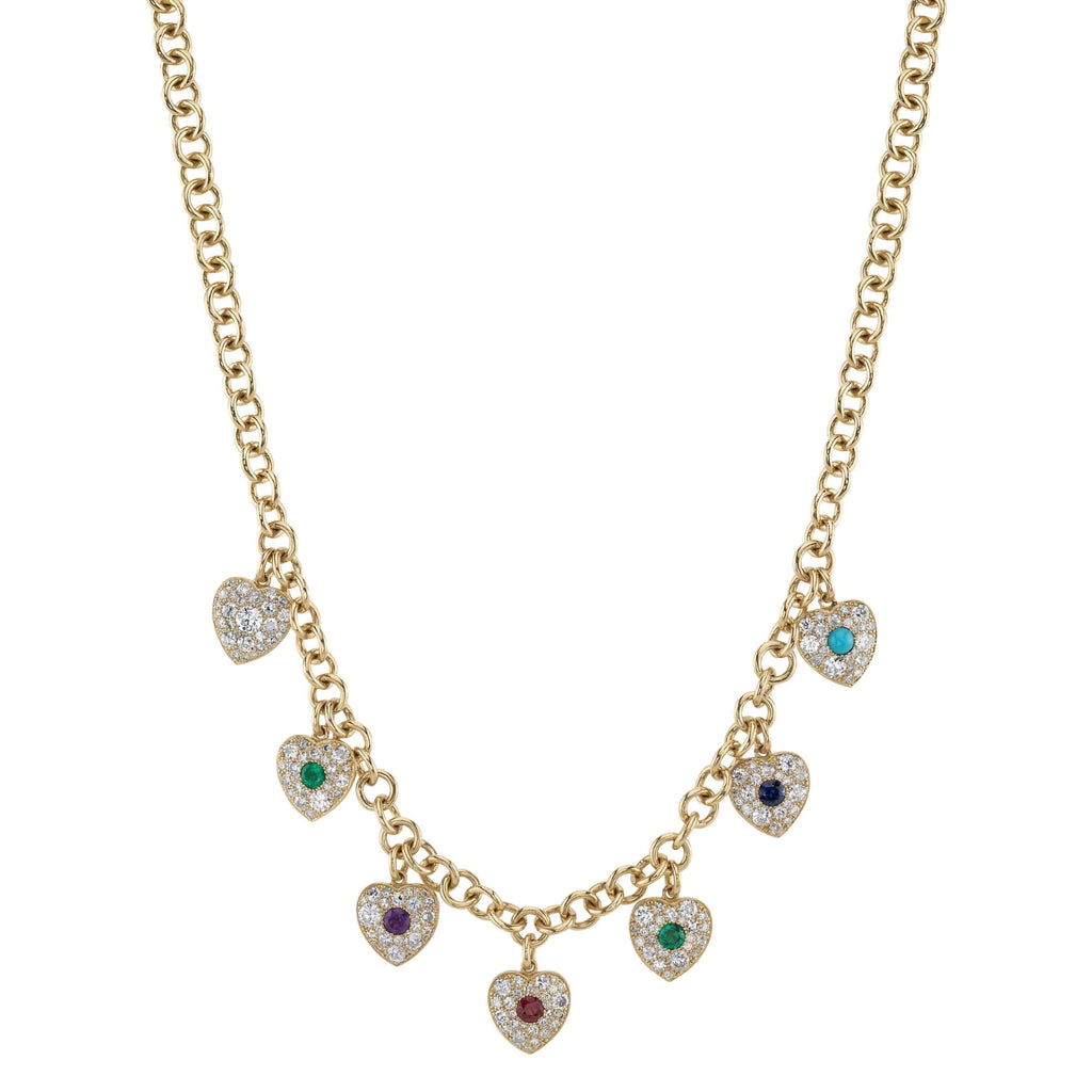 
Single Stone's Dearest necklace band  featuring This colorful Victorian inspired charm necklace showcases a gallery of gemstones holding a hidden term of endearment. Within each heart, various gemstones are arranged in order (diamond, emerald, amethyst, ruby, emerald, sapphire and turquoise) spelling out the word DEAREST. 
Popular in the Victorian era, this type of jewelry was given to loved ones to express secret romantic messages, thus reminding the one who wore it how dear they were to their suitor's heart.
The seven heart charms are comprised of approximately 5.30ctw varying antique cut diamonds and approximately 1.50ctw of color center gemstones set in our cobblestone style on our 17" handcrafted 18K yellow gold Mini Club chain.

