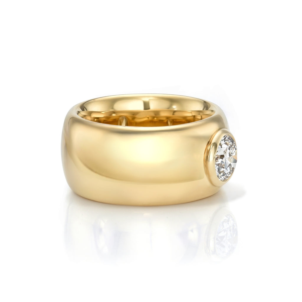Single Stone's ADRINA  featuring 1.00ct J/SI2 GIA certified old European cut diamond bezel set in a handcrafted 18K yellow gold wide domed mounting.
