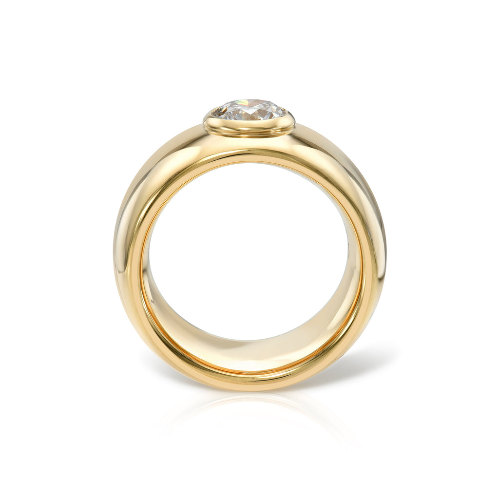 Single Stone's ADRINA  featuring 1.00ct J/SI2 GIA certified old European cut diamond bezel set in a handcrafted 18K yellow gold wide domed mounting.
