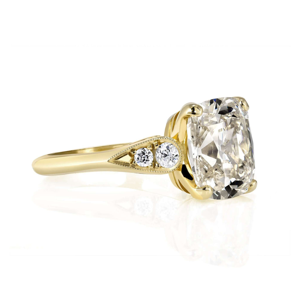 Single Stone's AMANDA ring  featuring 3.35ct N/SI1 GIA certified antique cushion cut diamond with 0.16ctw old European cut accent diamonds prong set in a handcrafted 18K yellow gold mounting.
