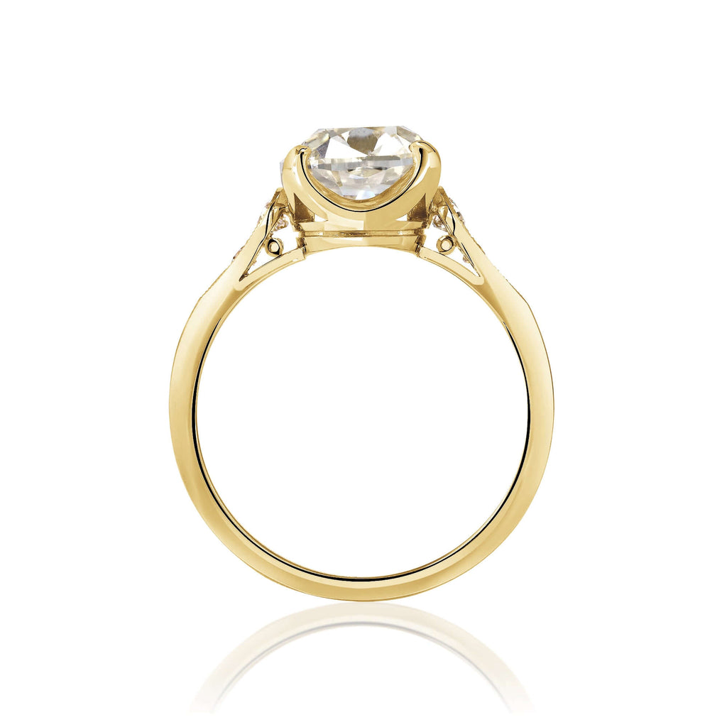 Single Stone's AMANDA ring  featuring 3.35ct N/SI1 GIA certified antique cushion cut diamond with 0.16ctw old European cut accent diamonds prong set in a handcrafted 18K yellow gold mounting.  
