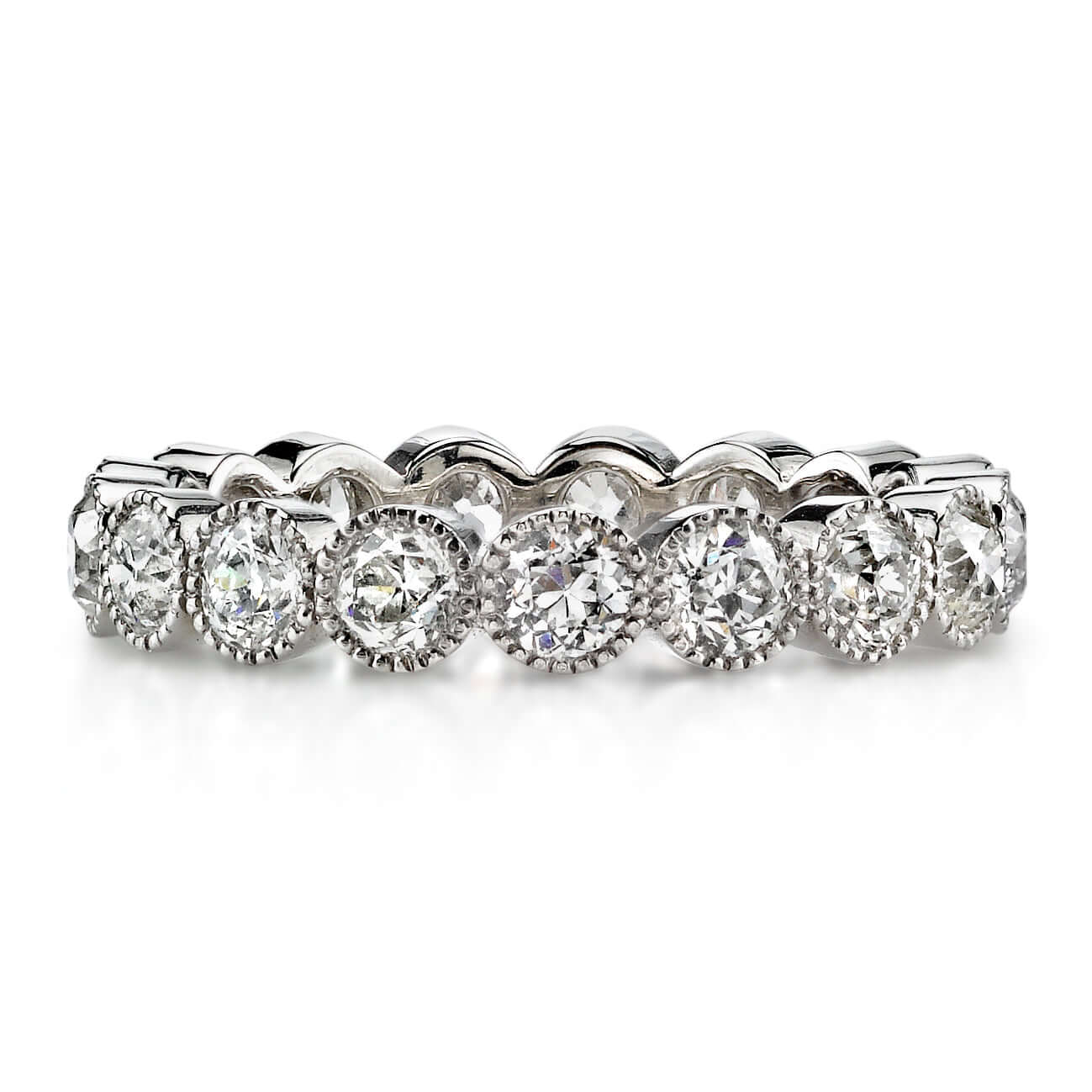 SINGLE STONE MEDIUM GABBY BAND | Approximately 1.75ctw old European cut diamonds set in a handcrafted bezel set eternity band. Approximate band with 3.6mm. Please inquire for additional customization.