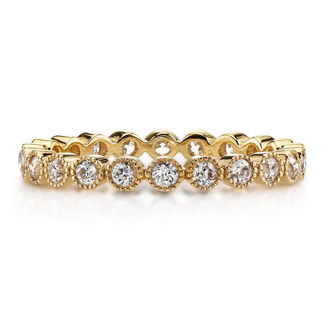 
Single Stone's Mini gabby band  featuring Approximately 0.70ctw old European cut diamonds bezel set in a handcrafted eternity band. 
Approximate band width 2.4mm.
Please inquire for additional customization,
