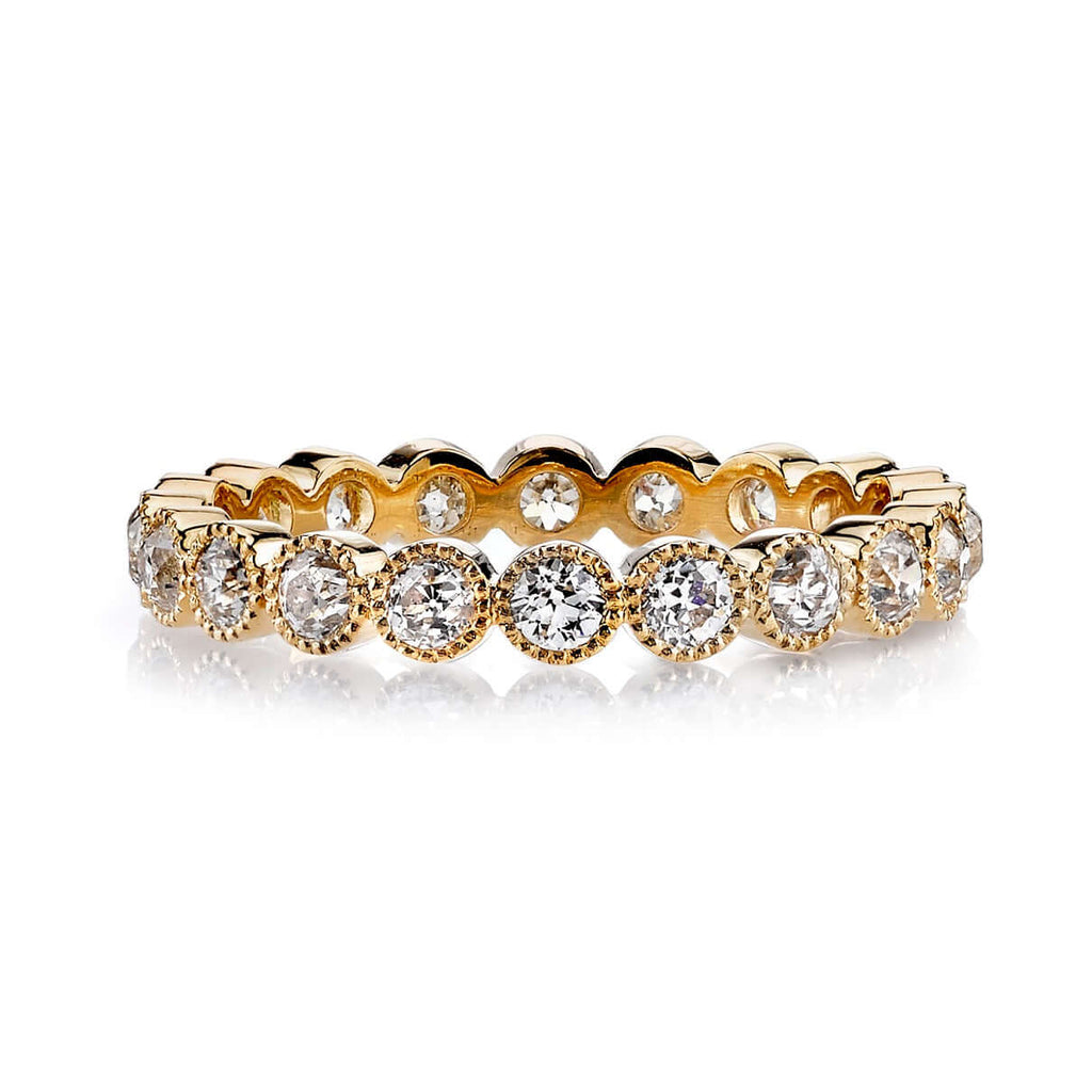 
Single Stone's Small gabby band  featuring Approximately 1.00ctw G-H/VS old European cut diamonds bezel set in a handcrafted eternity band. 
Approximate band with 2.9mm. 
Please inquire for additional customization. 
