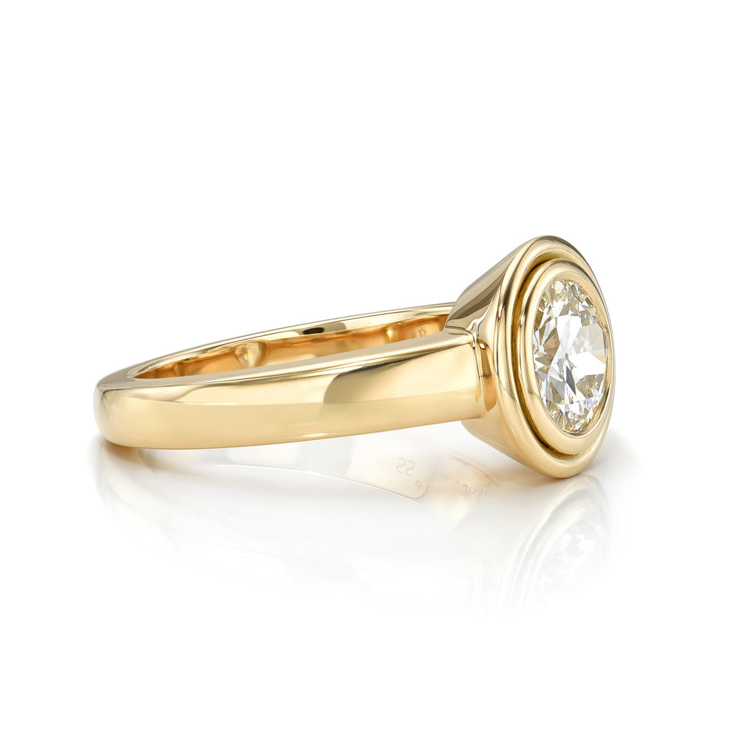 Single Stone's ARIA ring  featuring 1.12ct K/SI1 GIA certified old European cut diamond bezel set in a handcrafted 18K yellow gold mounting.
