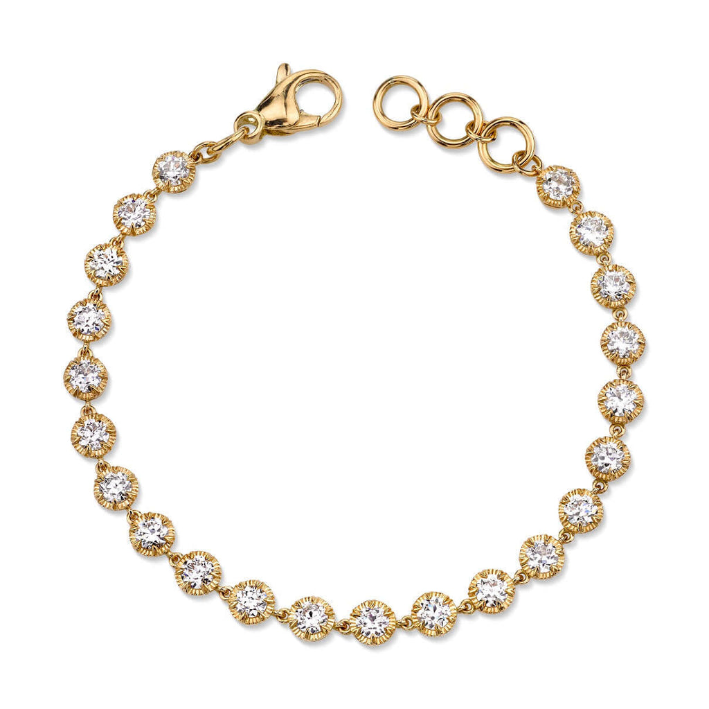 
Single Stone's Arielle bracelet  featuring 4.82ctw G-H/VS-SI old European cut diamonds prong set on a handcrafted 18K yellow gold tennis bracelet.  
Bracelet measures 7.5"
