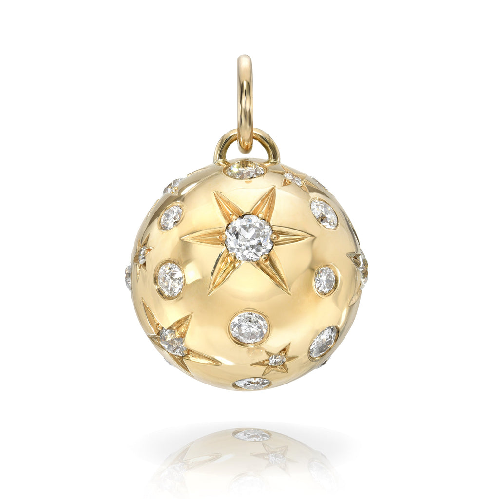 Single Stone's ASTRAEA pendant  featuring 6.60ctw varying old cut and round brilliant cut diamonds set in a handcrafted sphere shaped pendant with hand engraved star details.
