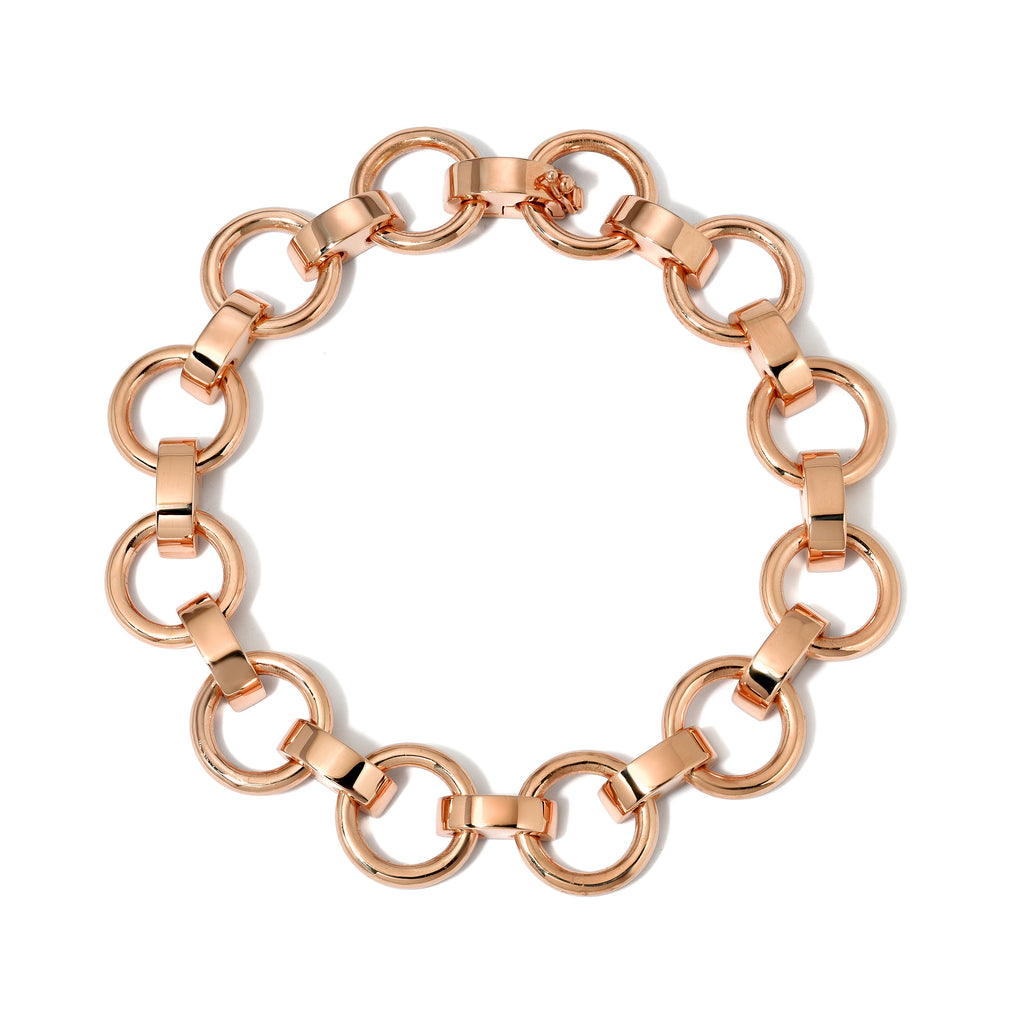 Single Stone's ASTRID BRACELET  featuring Handcrafted 18K gold round and saddle-shaped link bracelet with hidden closure.
