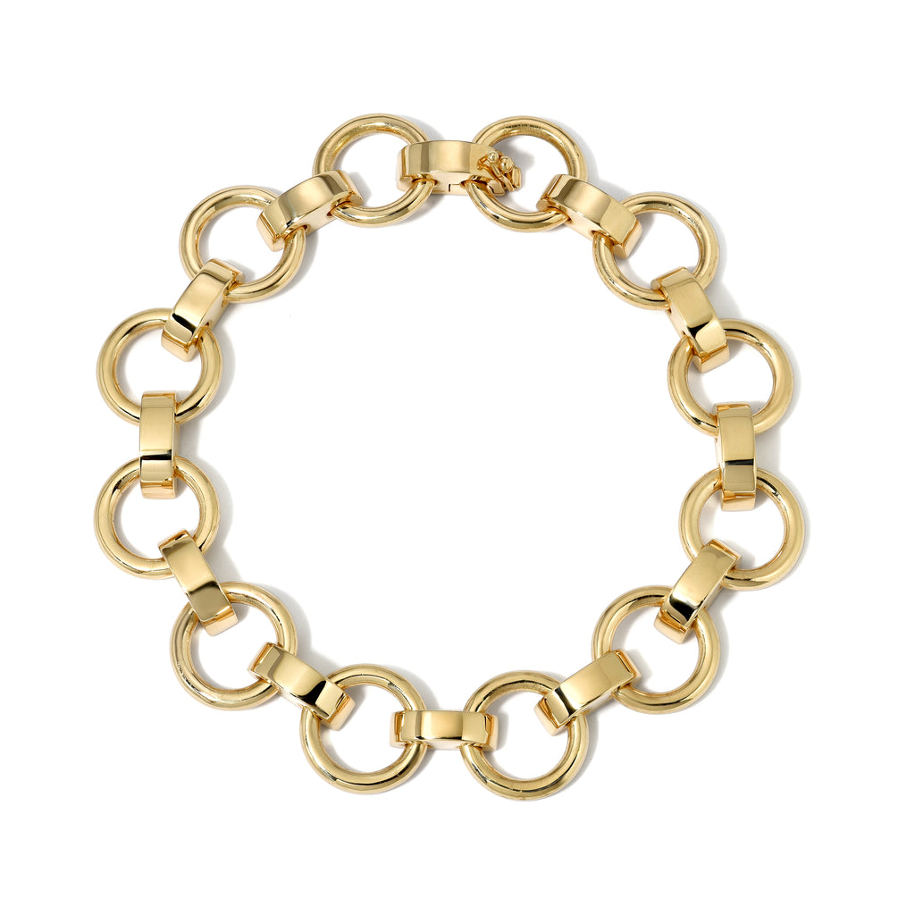 
Single Stone's Astrid bracelet  featuring Handcrafted 18K gold round and saddle-shaped link bracelet with hidden closure.
Bracelet measures 7.25".
