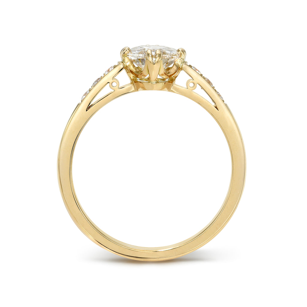 Single Stone's BAUER ring  featuring 1.01ct L/VS2 GIA certified pear shaped diamond with 0.06ctw old European cut accent diamonds set in a handcrafted 18K yellow gold mounting.  
