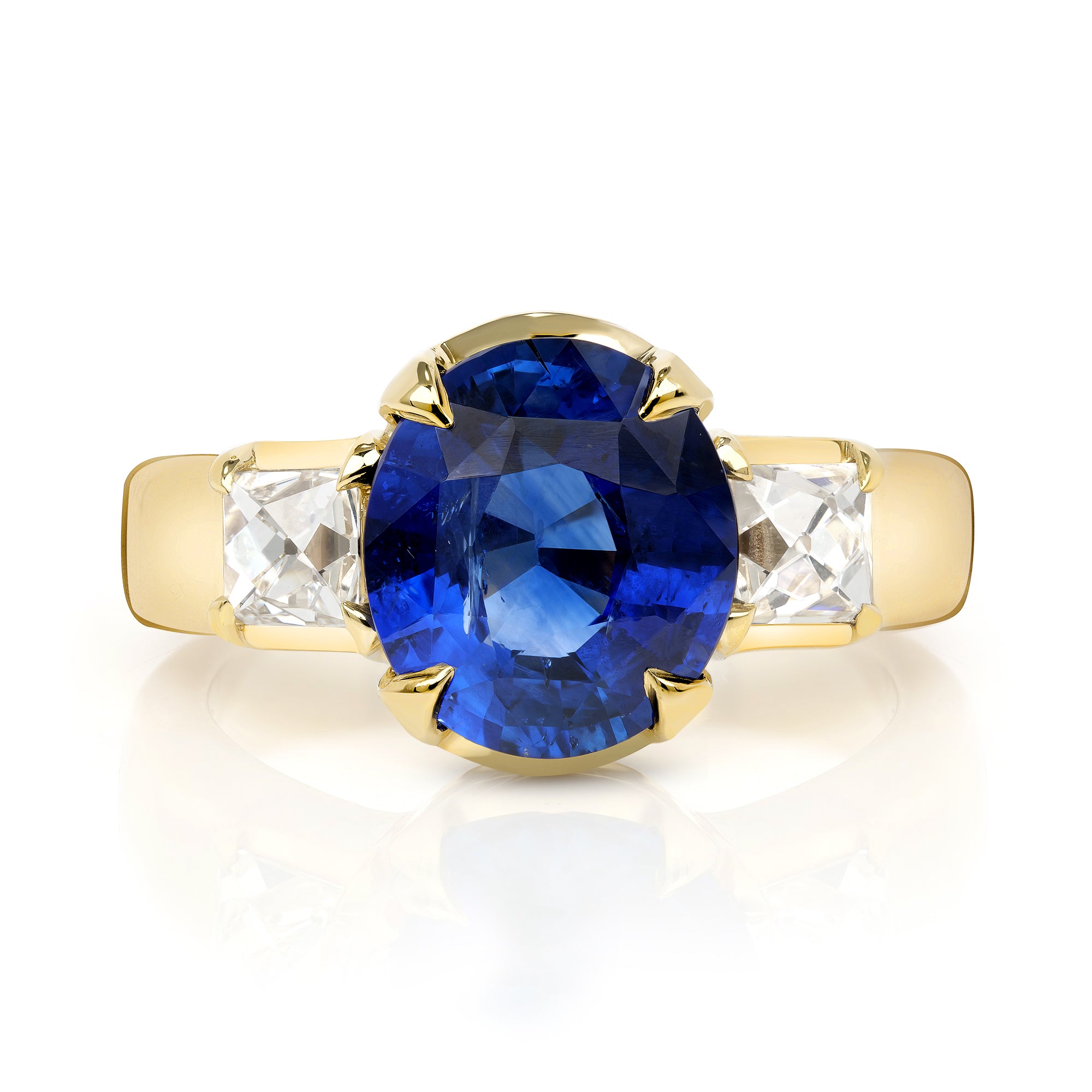SINGLE STONE BROOKLYN RING featuring 3.24ct GIA certified Sri Lankan oval cut blue sapphire with 0.88ctw French cut accent diamonds prong set in a handcrafted 18K yellow gold mounting.