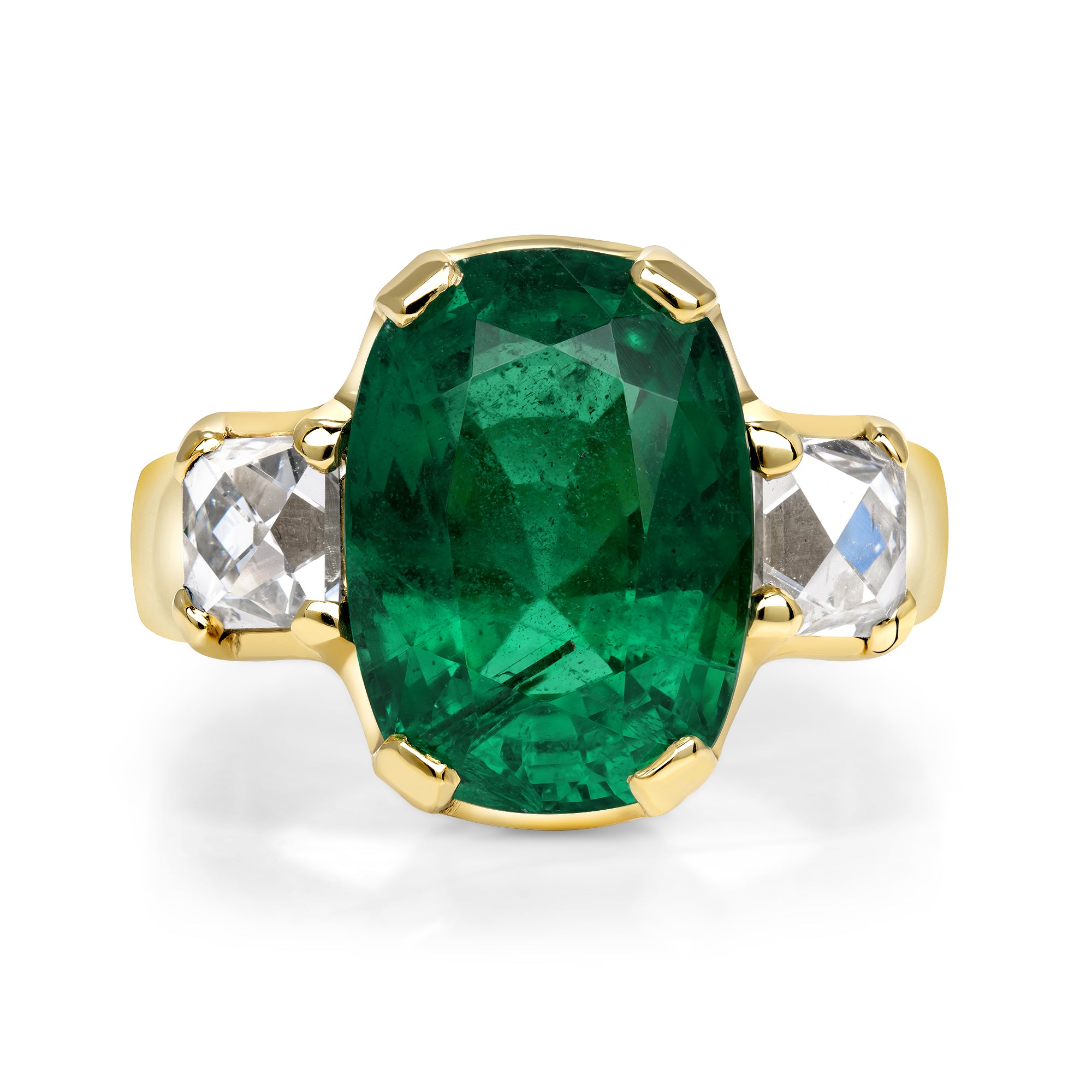 SINGLE STONE BROOKLYN RING featuring 6.08ct GIA certified Zambian cushion cut green emerald flanked by 1.61ctw GIA certified E-F/VS1 French cut diamonds prong set in a handcrafted 18K yellow gold mounting.