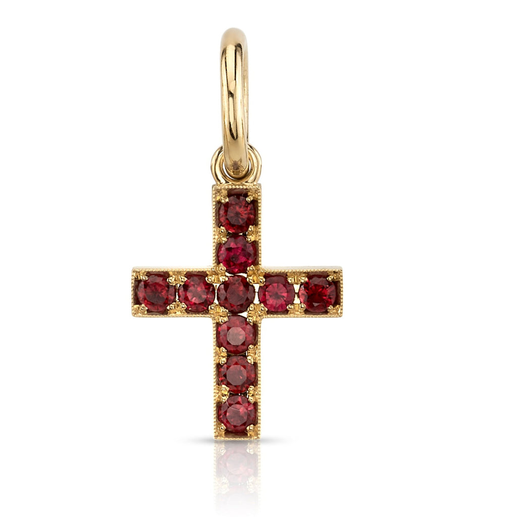Single Stone's CARMELA CROSS WITH GEMSTONES pendant  featuring Approximately 0.80ctw round cut gemstones pavé set in a handcrafted 18K yellow gold cross pendant. Cross measures 14.20mm x 17mm. Price does not include chain. Please inquire for additional customization.
