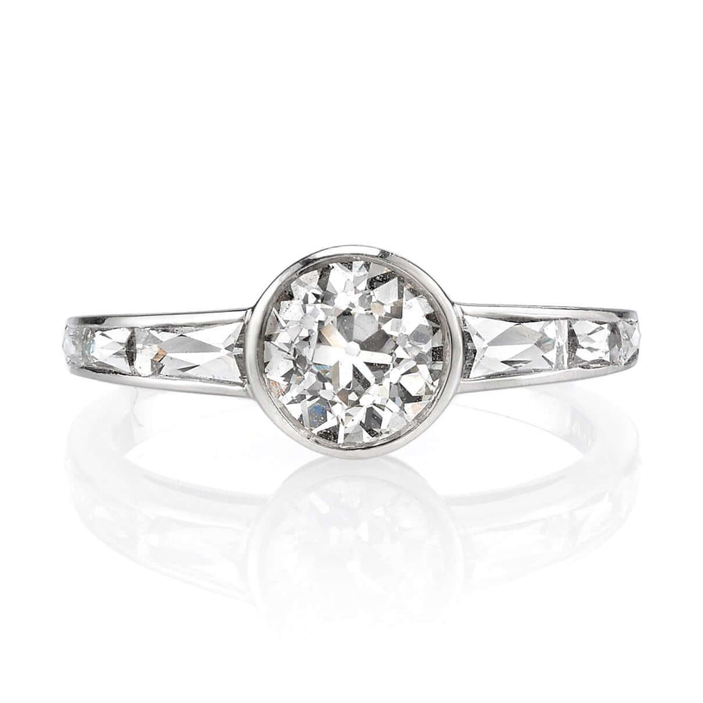Single Stone's CHRISTINA ring  featuring 1.04ct K/VS2 GIA certified old European cut diamond with 0.60ctw French cut accent diamonds set in a handcrafted platinum mounting. 
