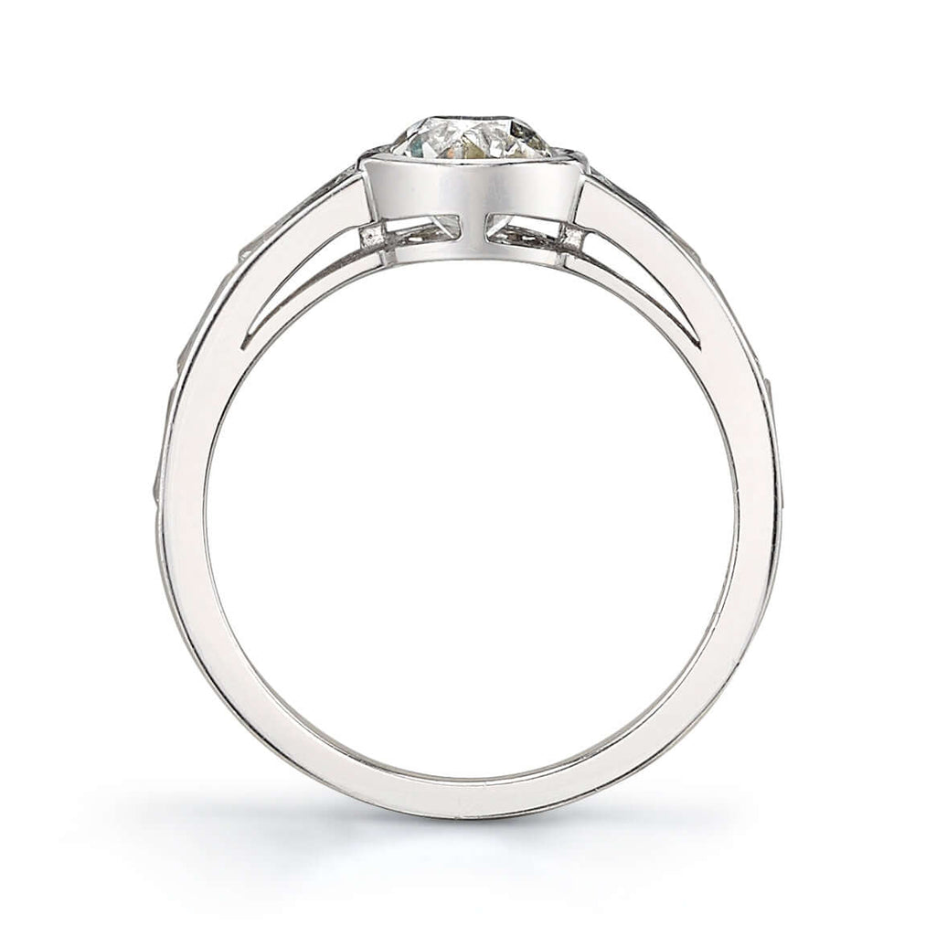 Single Stone's CHRISTINA ring  featuring 1.04ct K/VS2 GIA certified old European cut diamond with 0.60ctw French cut accent diamonds bezel set in a handcrafted platinum mounting.
