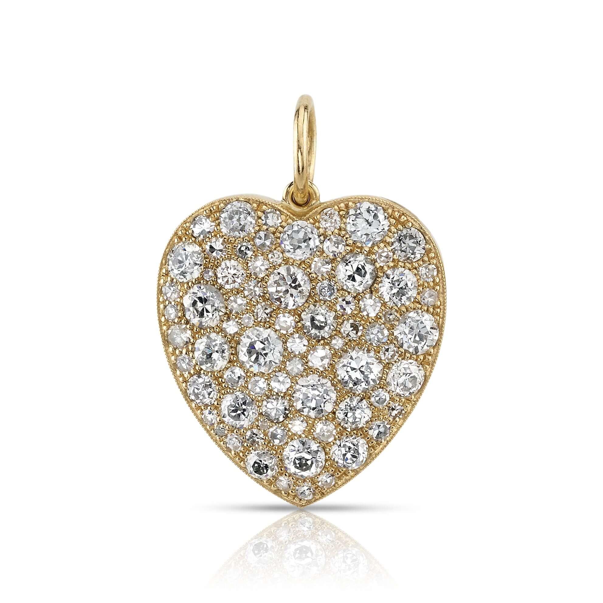 SINGLE STONE LARGE COBBLESTONE HEART PENDANT featuring Approximately 4.00ctw varying old cut and round brilliant cut diamonds set in a handcrafted 18K yellow gold heart pendant. Charm measures 22mm x 23mm. Price does not include chain. *Cobblestone patter