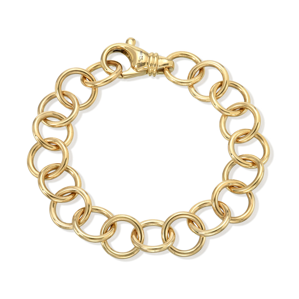 
Single Stone's Club bracelet band  featuring Handcrafted 18K yellow gold round link bracelet. Charms sold separately.
Bracelet measures 7.5".
Please inquire for additional customization. 
