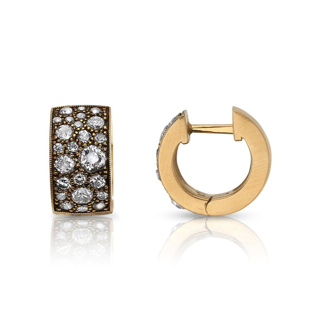 Single Stone's JENNI COBBLESTONE HUGGIES earrings  featuring Approximately 1.40ctw - 1.60ctw varying old cut and round brilliant cut diamonds set in handcrafted 18k yellow gold huggie earrings. Price may vary according to diamond weight. *Cobblestone pattern may vary from piece to piece
