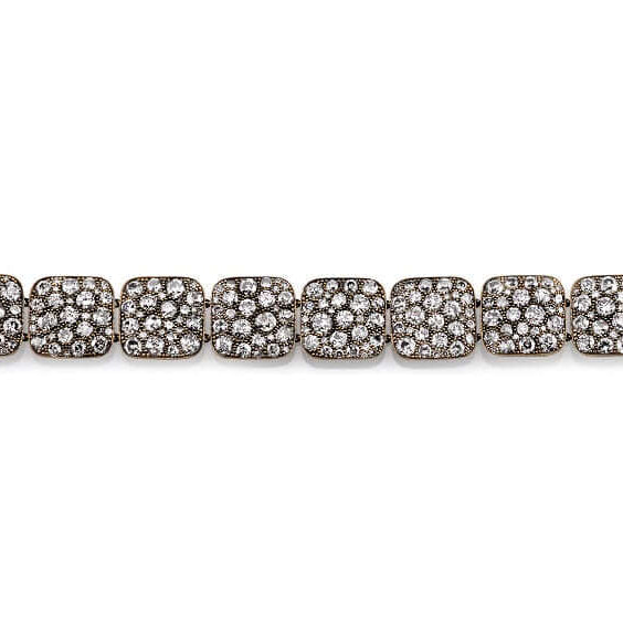 SINGLE STONE COBBLESTONE LINK BRACELET featuring Approximately 21.35ctw varying old cut and round brilliant cut diamonds set in a handcrafted, oxidized 18K yellow gold cobblestone link bracelet.