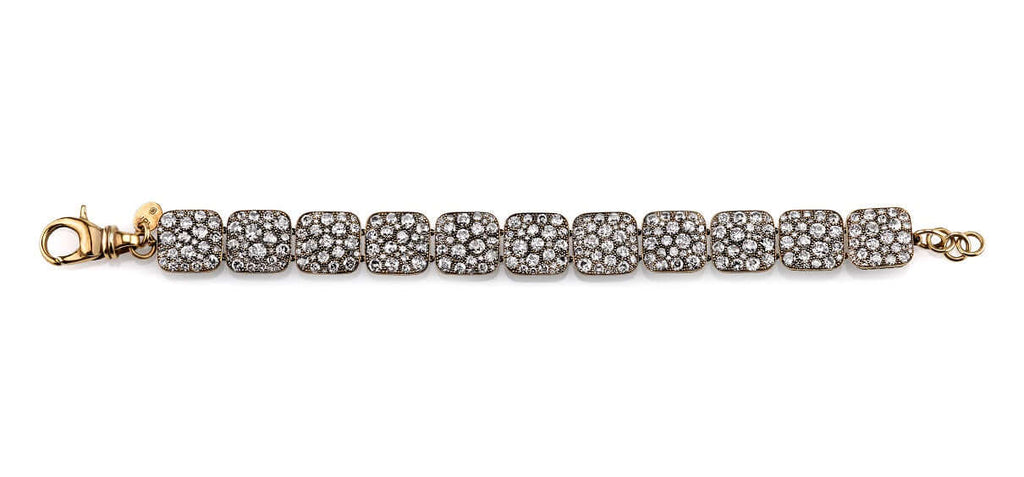 Single Stone's COBBLESTONE LINK BRACELET  featuring Approximately 21.35ctw varying old cut and round brilliant cut diamonds prong set in a handcrafted, oxidized 18K yellow gold cobblestone link bracelet. 
