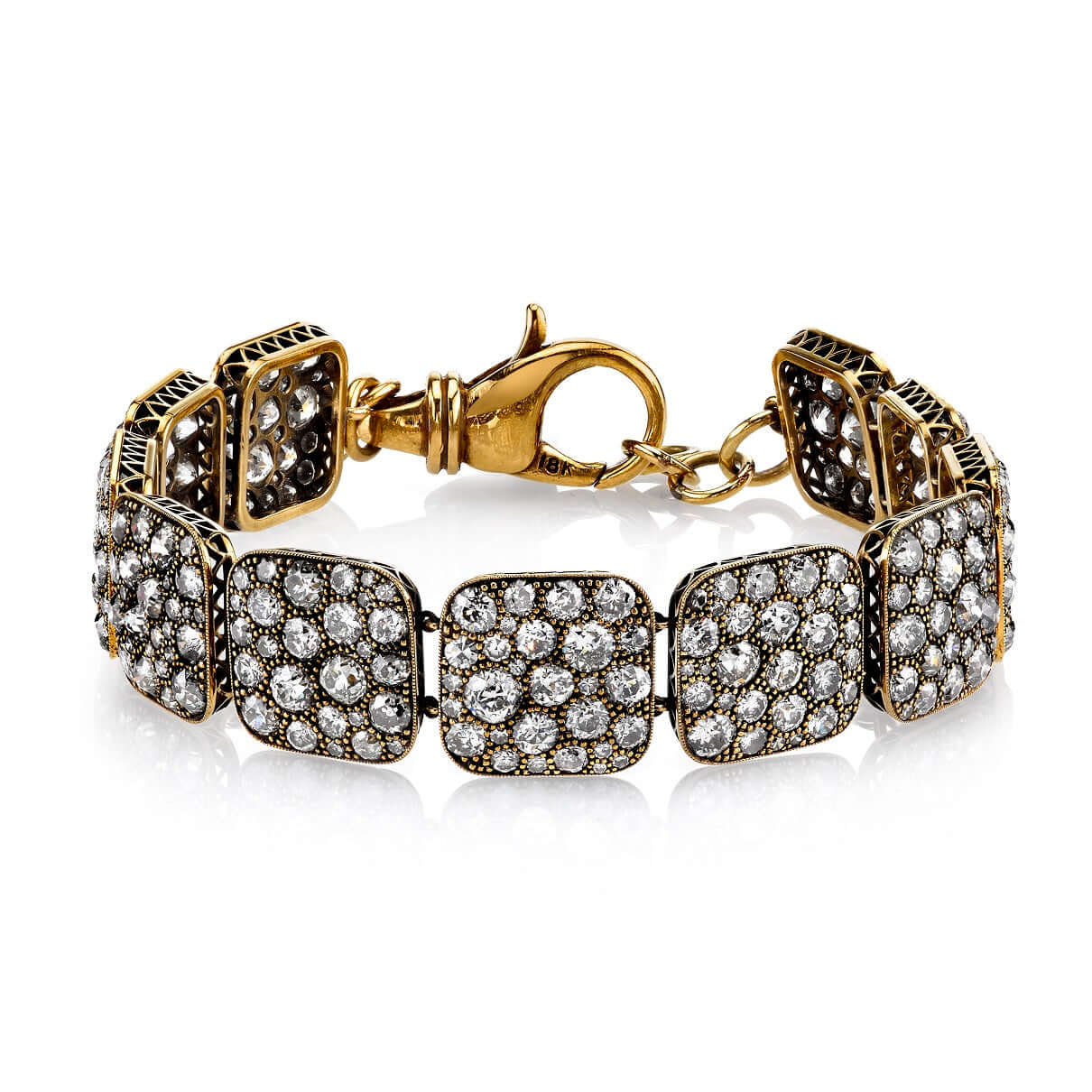 SINGLE STONE COBBLESTONE LINK BRACELET featuring Approximately 21.35ctw varying old cut and round brilliant cut diamonds set in a handcrafted, oxidized 18K yellow gold cobblestone link bracelet.