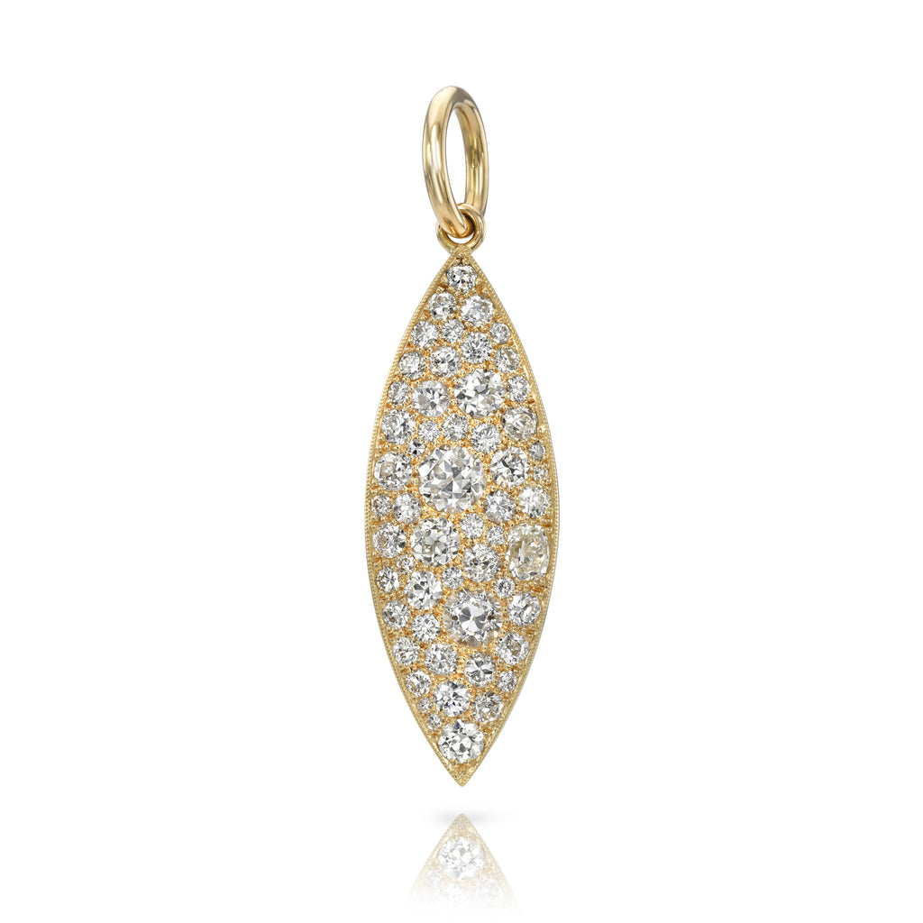 
Single Stone's Cobblestone naya pendant  featuring 3.44ctw varying old cut and round brilliant cut diamonds set in a handcrafted 18K yellow gold marquise-shaped pendant.
Price does not include chain. 

