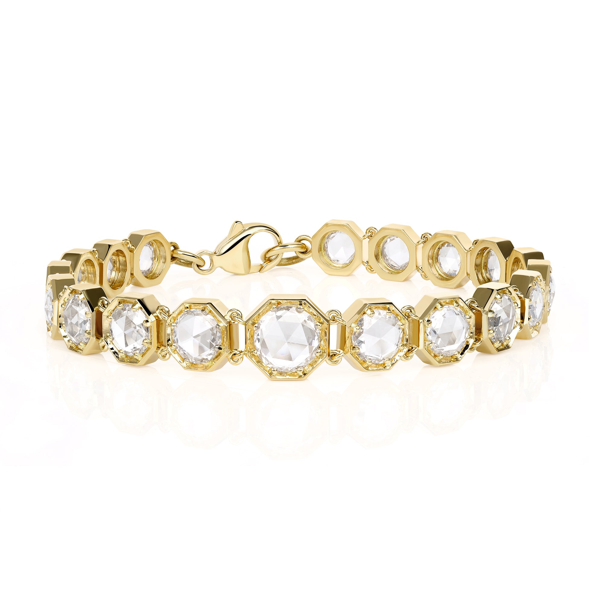 SINGLE STONE COLBY BRACELET featuring 1.10ct I/SI2 GIA certified round rose cut diamond accompanied by 7.94ctw round rose cut diamonds prong set in a handcrafted 18K yellow gold bracelet. Bracelet measures 7.5".