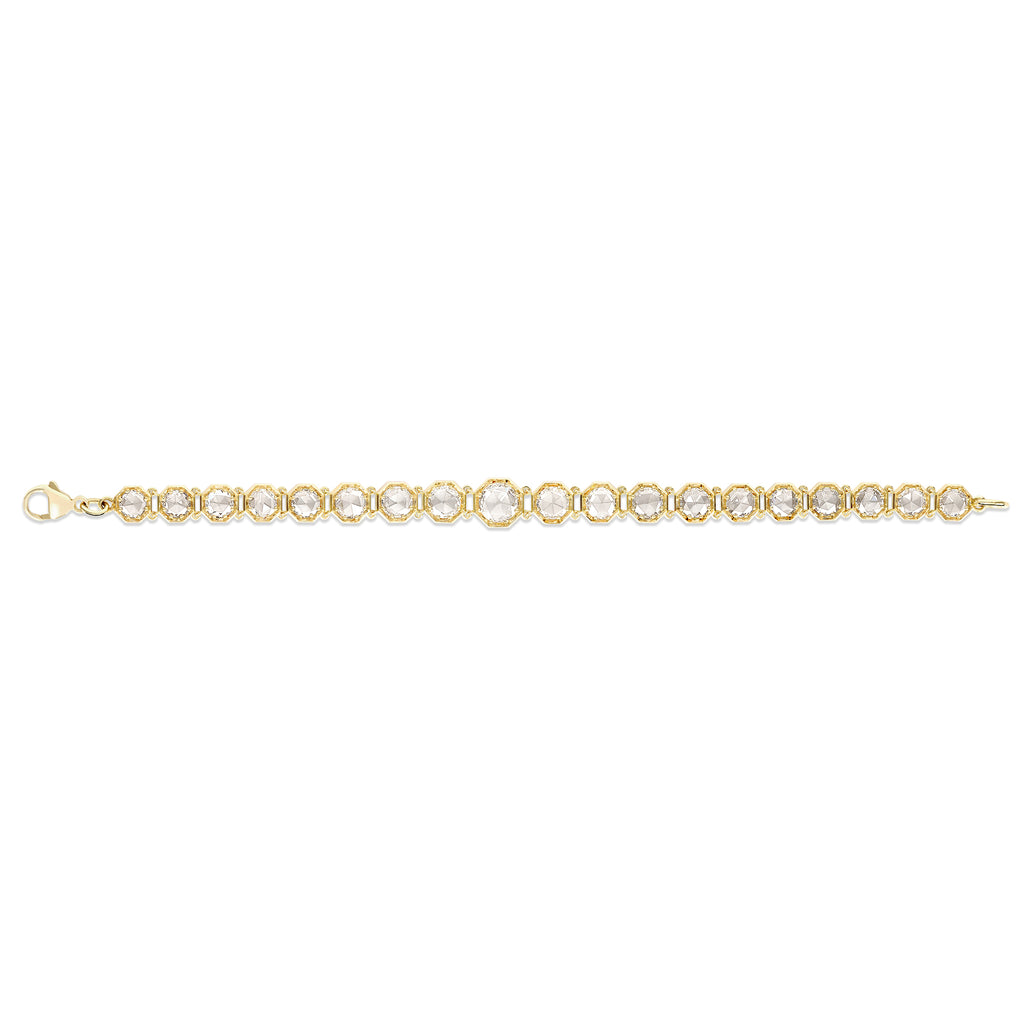 Single Stone's COLBY BRACELET  featuring 1.10ct I/SI2 GIA certified round rose cut diamond accompanied by 7.94ctw round rose cut diamonds prong set in a handcrafted 18K yellow gold bracelet. Bracelet measures 7.5&quot;.
