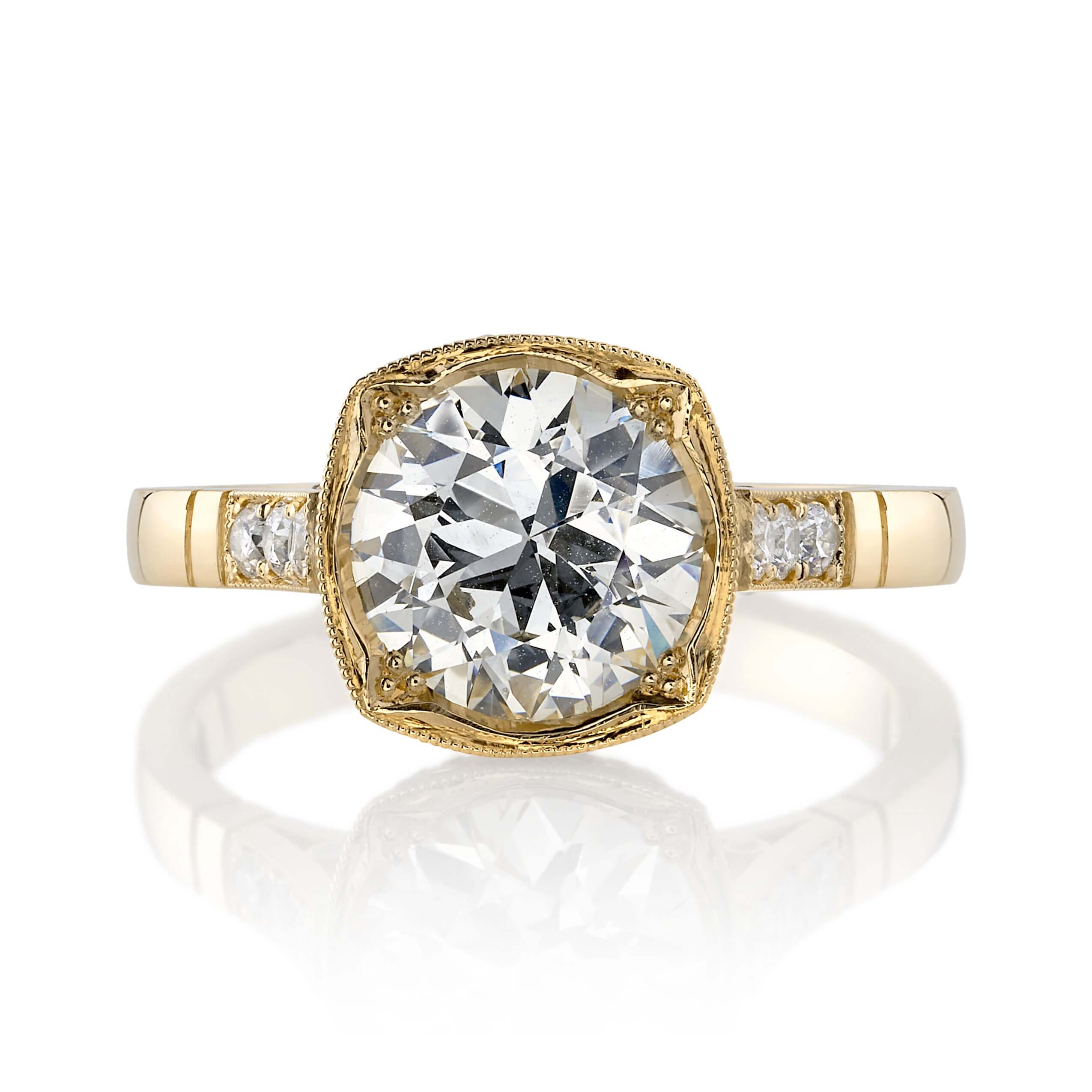 SINGLE STONE COLETTE RING featuring 1.73ct N/VVS2 GIA certified old European cut diamond with 0.25ctw old European cut accent stones set in a handcrafted 18K yellow gold mounting.