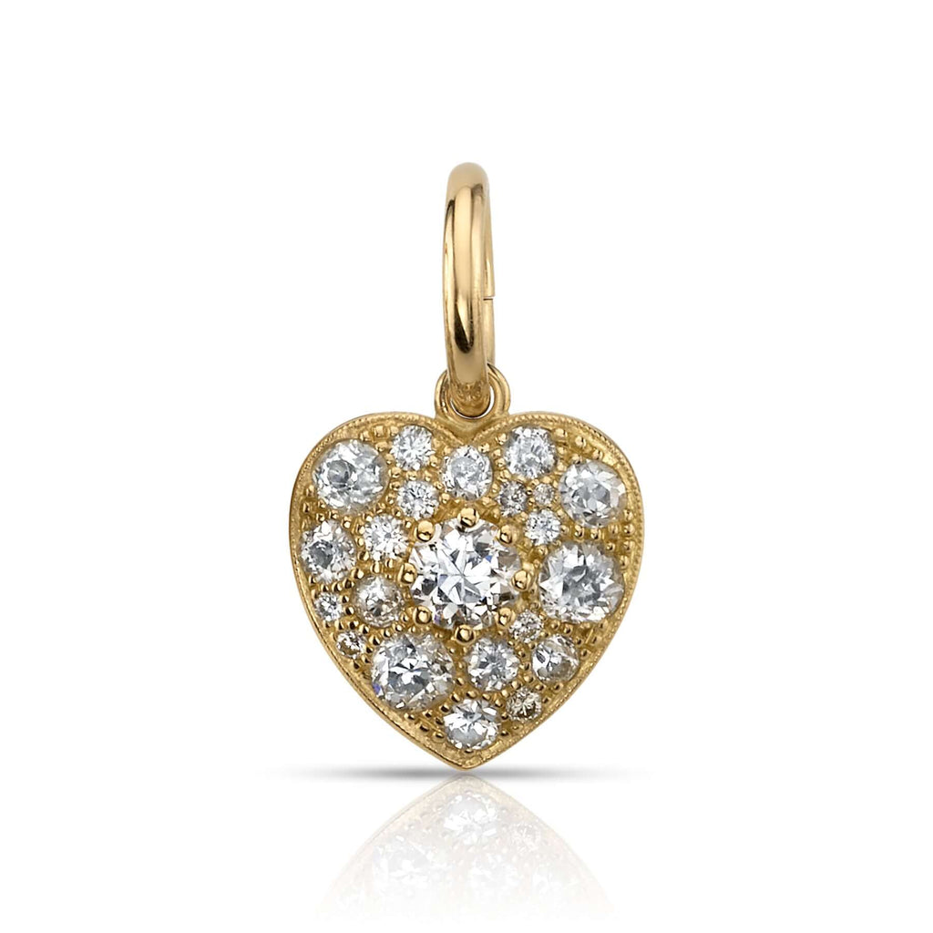 
Single Stone's Small cobblestone heart with gemstones pendant  featuring Approximately 0.80ctw various old cut and round brilliant cut diamonds set in a handcrafted 18K yellow gold heart pendant with an approximately 0.25ctw old European cut diamond or color center gemstone. Heart measures 12.5mm x 11.7mm. 
Price does not include chain.
*Cobblestone pattern may vary from piece to piece
