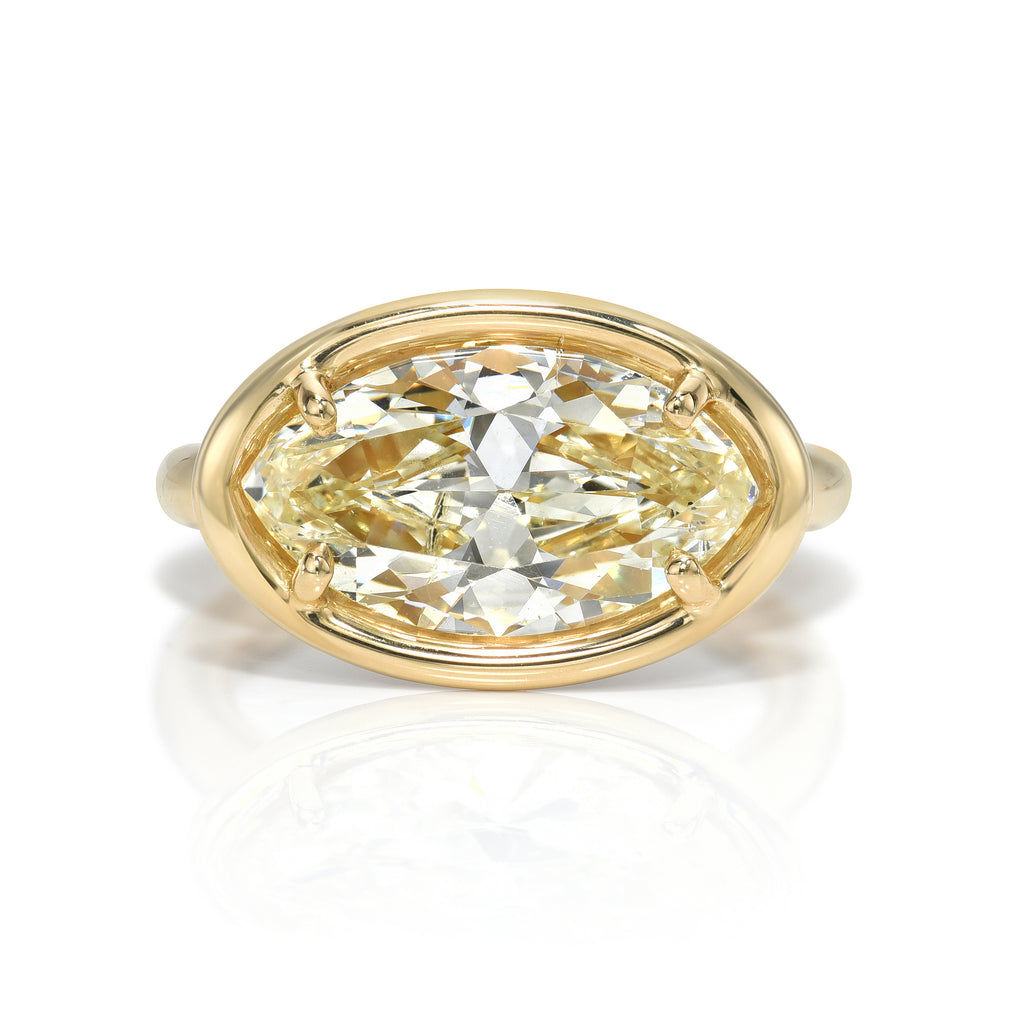 
Single Stone's Devi ring  featuring 4.23ct S-T/SI2 GIA certified marquise cut diamond with 0.95ctw old European cut accent diamonds prong set in a handcrafted 18K yellow gold mounting. 
 
 
