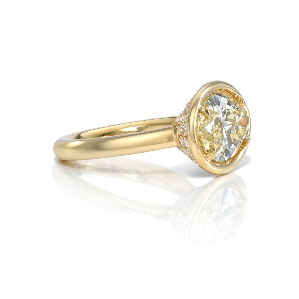 Single Stone's DEVI ring  featuring 4.23ct S-T/SI2 GIA certified marquise cut diamond with 0.95ctw old European cut accent diamonds prong set in a handcrafted 18K yellow gold mounting.
