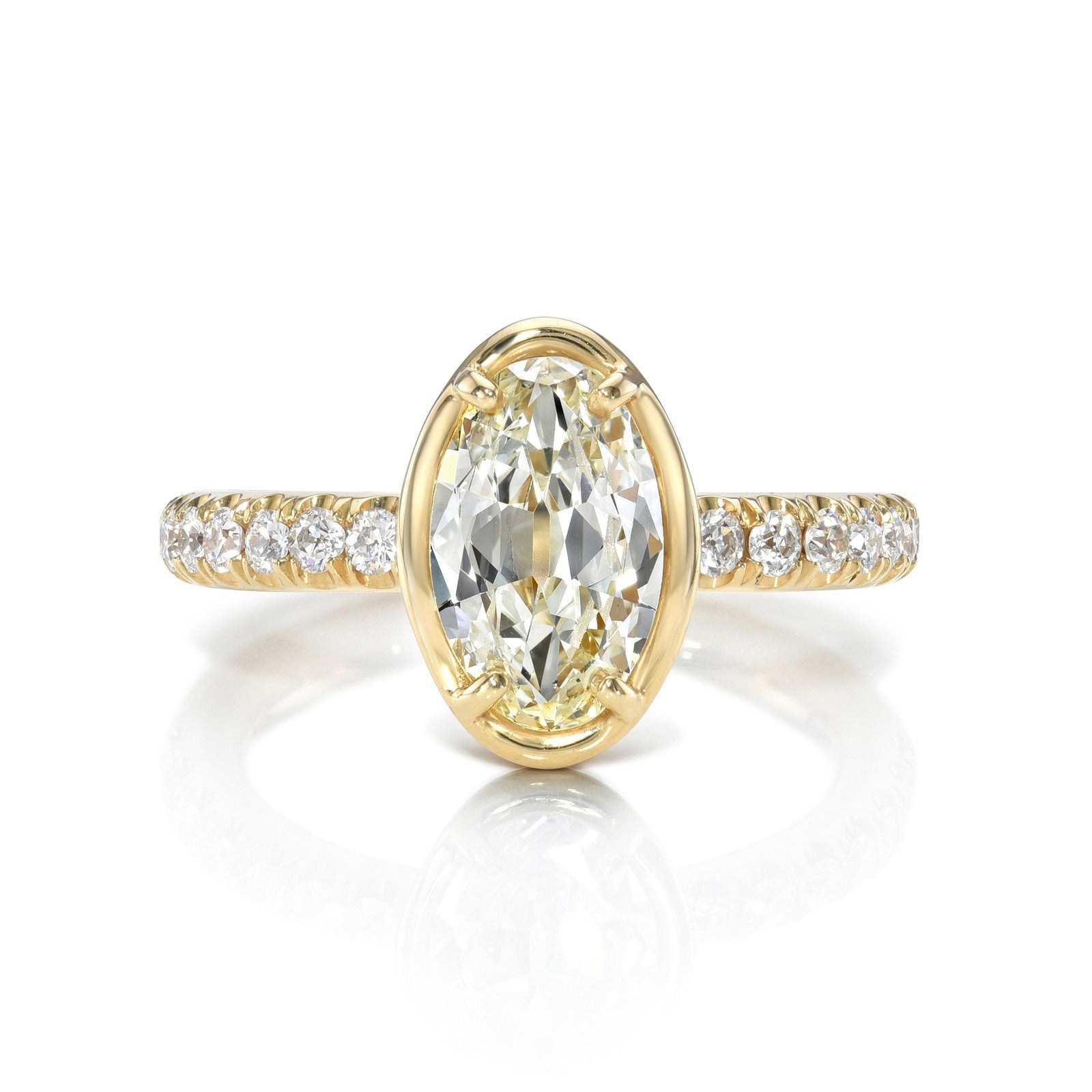 SINGLE STONE ELLA RING featuring 1.39ct L/VS2 GIA certified moval cut diamond with 0.35ctw old European cut accent diamonds prong set in a handcrafted 18K yellow gold mounting.