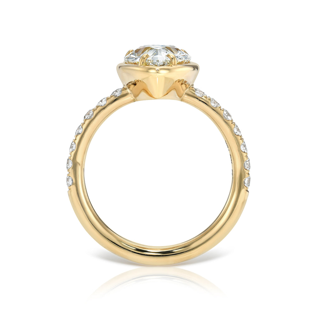 Single Stone's ELLA ring  featuring 2.13ct H/SI1 GIA certified pear shaped diamond with 0.36ctw old European cut accent diamonds prong set in a handcrafted 18K yellow gold mounting.
