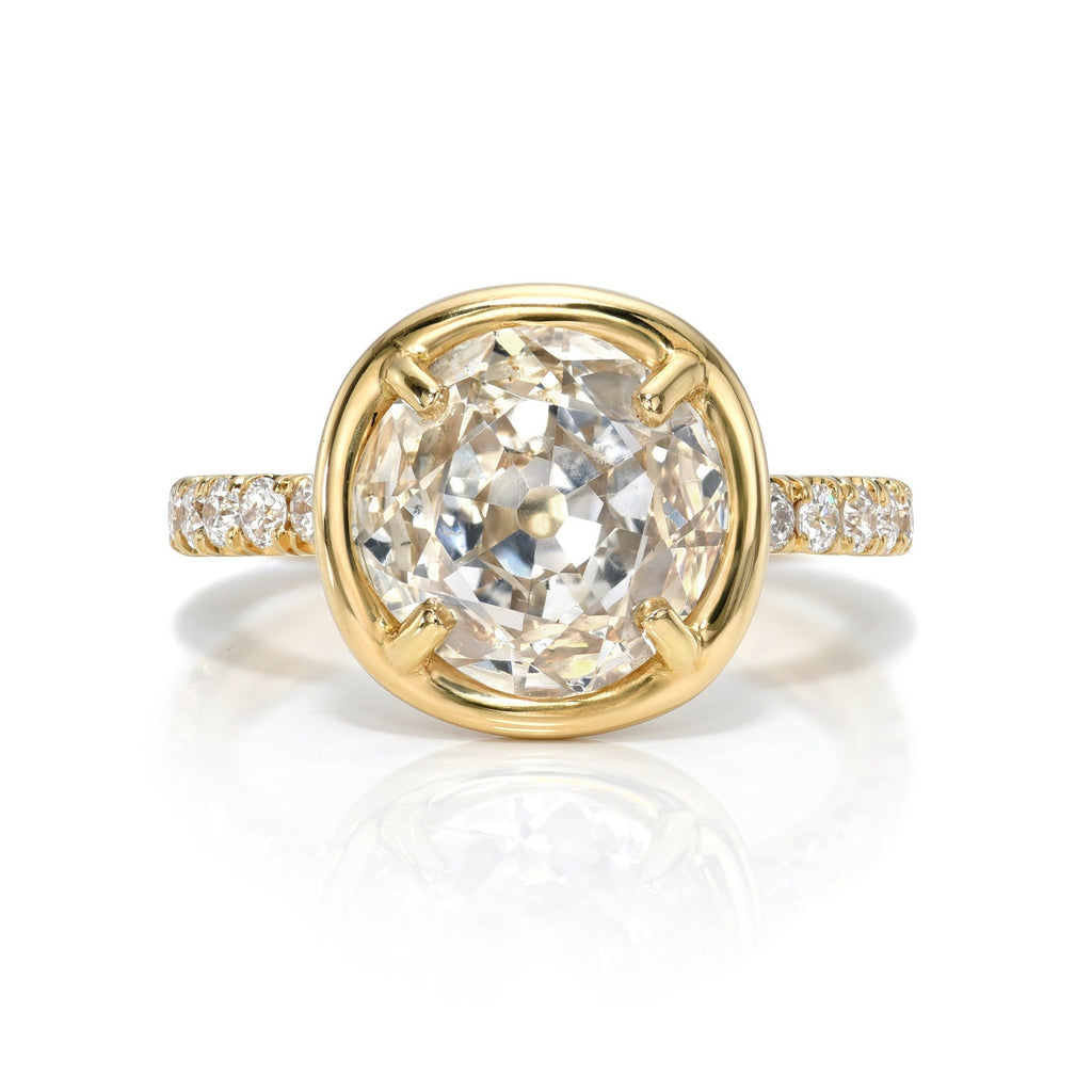 
Single Stone's Ella ring  featuring 2.35ct J/SI2 GIA certified antique cushion cut diamond with 0.36ctw old European cut accent diamonds prong set in a handcrafted 18K yellow gold mounting,
