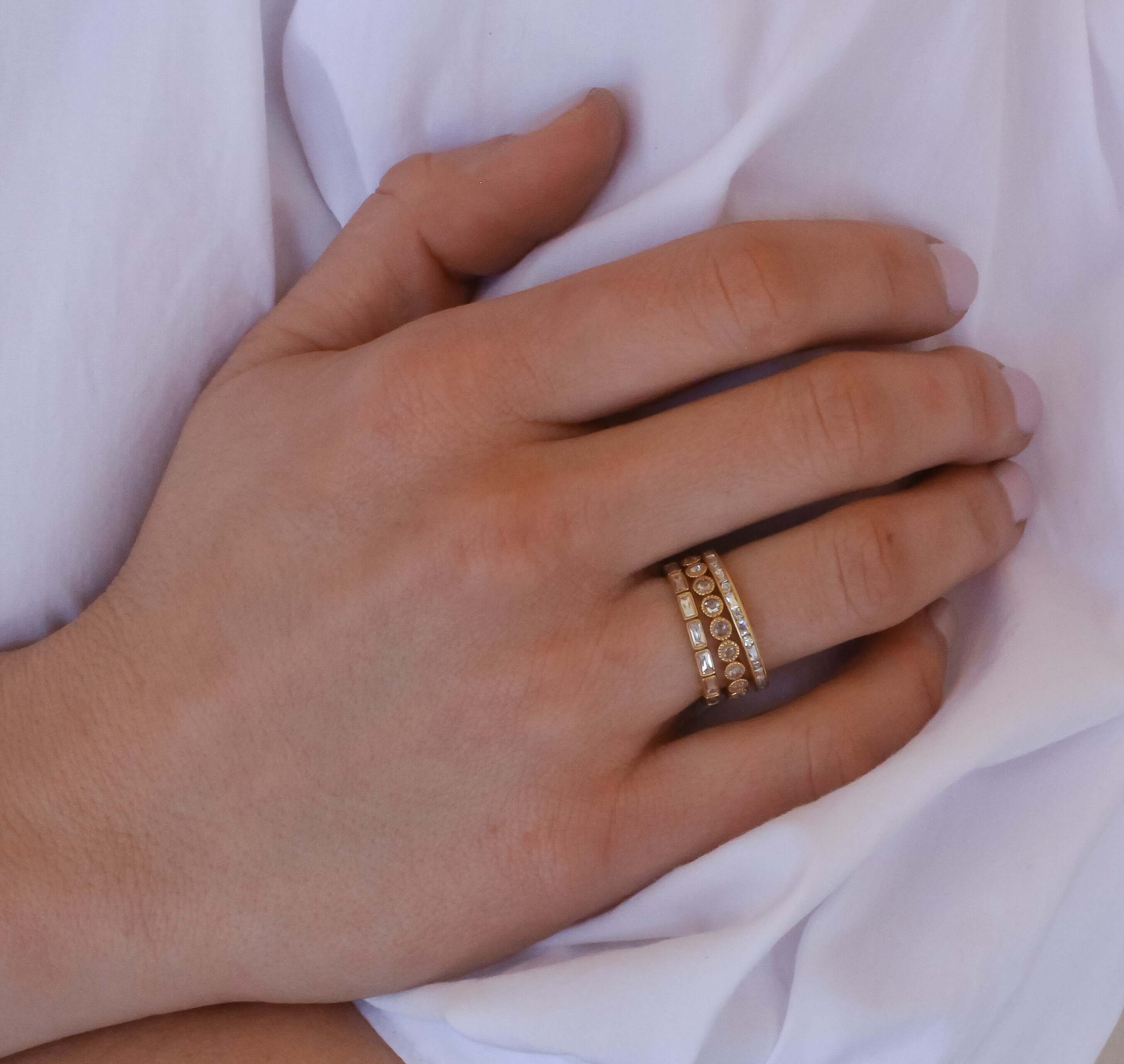 SINGLE STONE MICHELLE BAND | Approximately 0.65ctw French cut and old European cut diamonds set in a handcrafted channel set eternity band. ﻿Approximate band width 2.1mm. All of our jewelry is individually made to order in Los Angeles, please allow 6-8 we