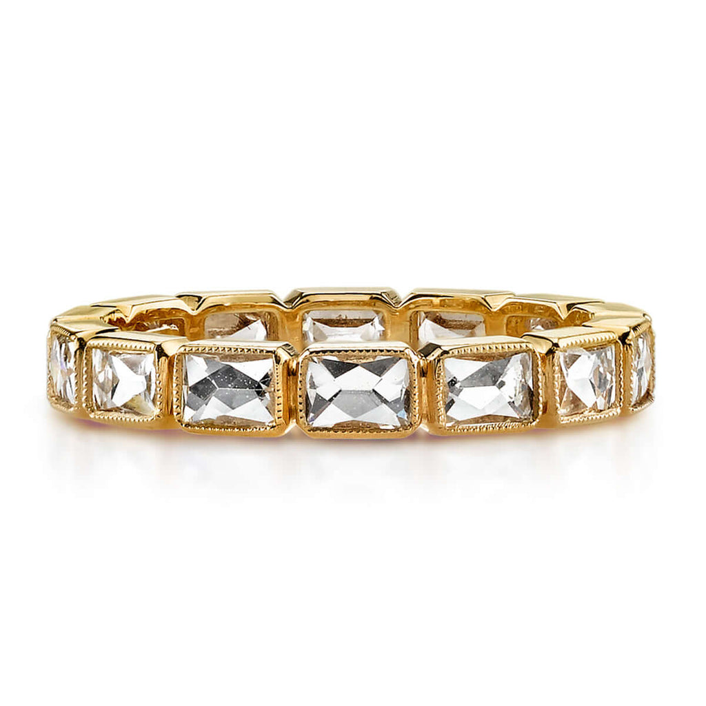 
Single Stone's Large julia band  featuring Approximately 1.30-1.60ctw G-H/VS French cut diamonds bezel set in a handcrafted eternity band. 

Approximate band width 3mm.
Please inquire for additional customization. 
