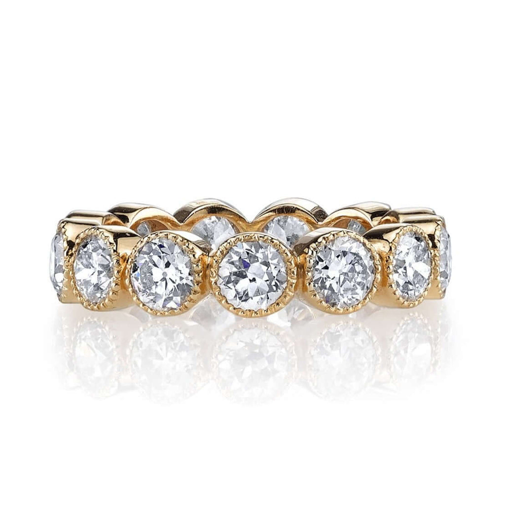 Single Stone's LARGE GABBY band  featuring Approximately 3.00-3.30ctw old European cut diamonds bezel set in a handcrafted eternity band. Approximate band width 4.8mm.

