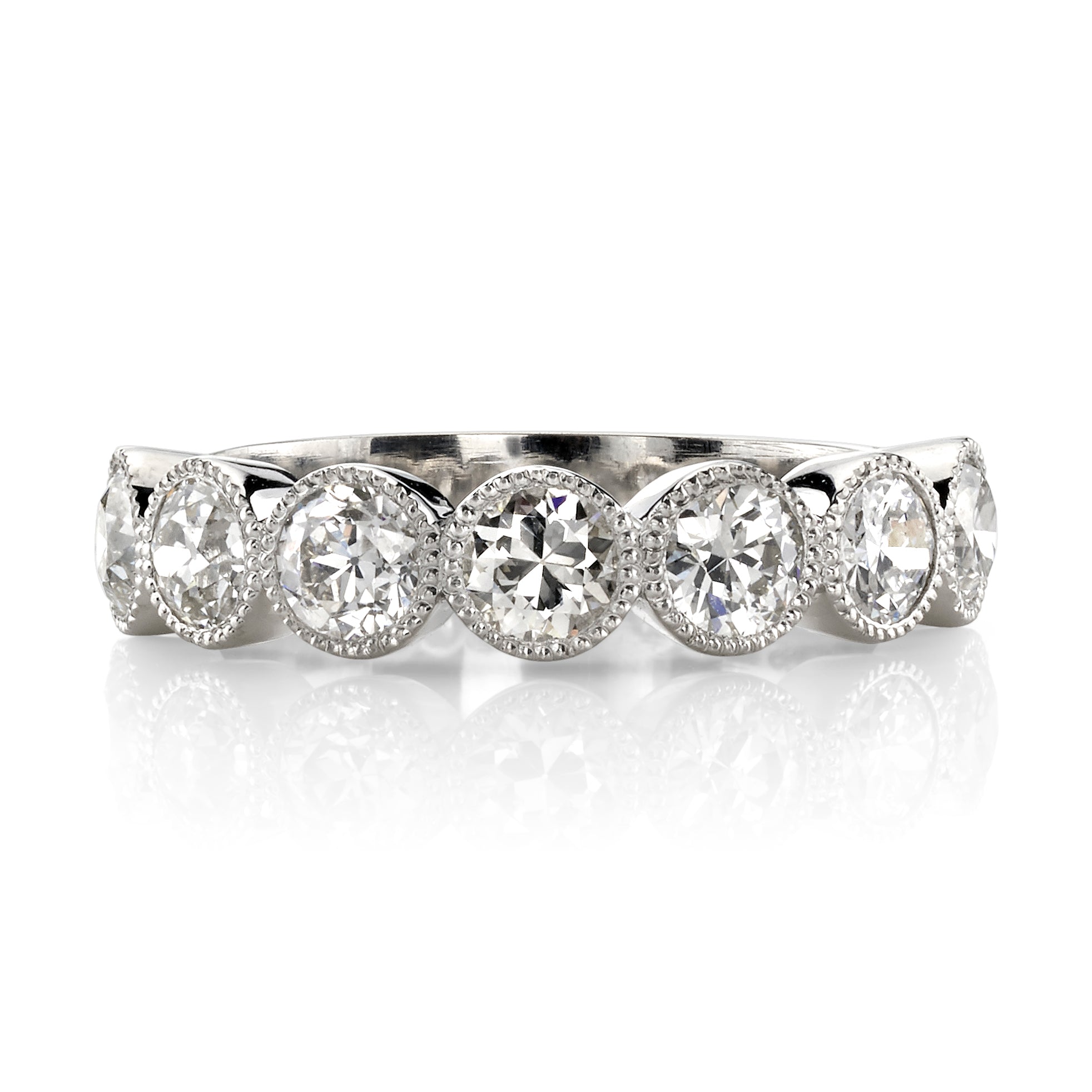 SINGLE STONE LARGE GABBY HALF BAND BAND | Approximately 1.50-1.70ctw old European cut diamonds set in a handcrafted bezel set half-eternity band. Approximate band width 4.8mm.