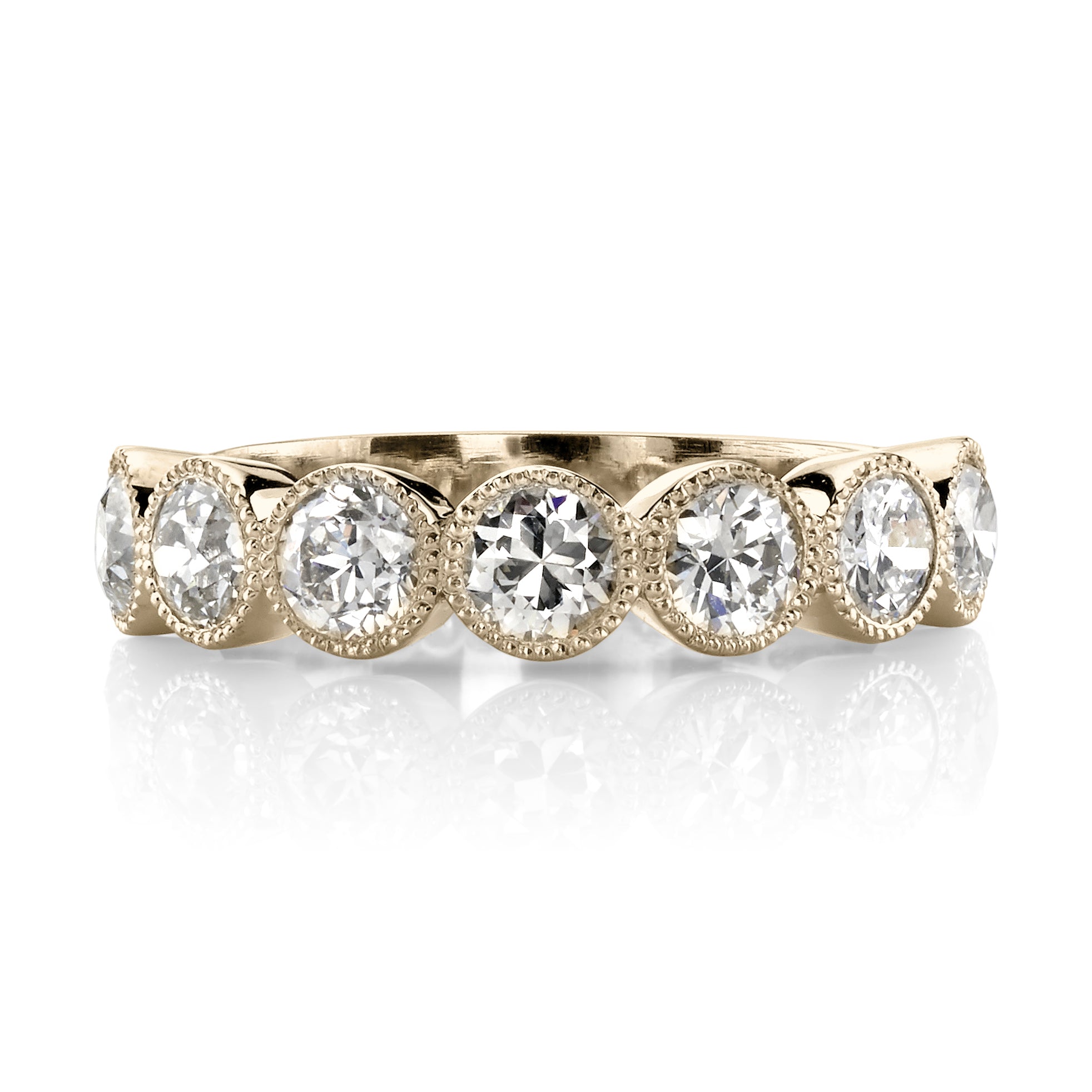 SINGLE STONE LARGE GABBY HALF BAND BAND | Approximately 1.50-1.70ctw old European cut diamonds set in a handcrafted bezel set half-eternity band. Approximate band width 4.8mm.