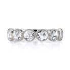 SINGLE STONE LARGE ROSE CUT GABBY HALF BAND BAND | ﻿Approximately 0.90ctw rose cut diamonds set in a handcrafted bezel set half-eternity band. Approximate band width 4.8mm. Please inquire for additional customization.