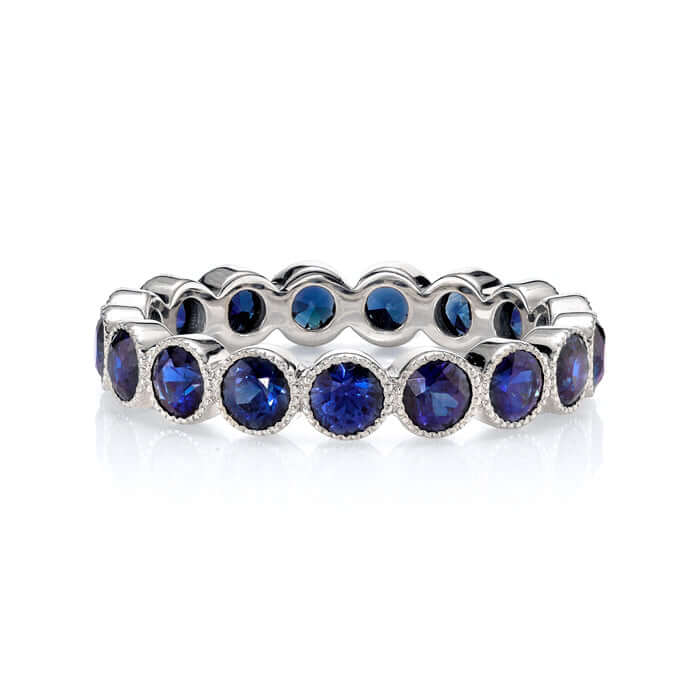 Single Stone's MEDIUM GABBY WITH GEMSTONES band  featuring Approximately 2.30ctw round cut gemstones bezel set in a handcrafted eternity band.  Approximate band with 3.6mm.  Please inquire for additional customization.
