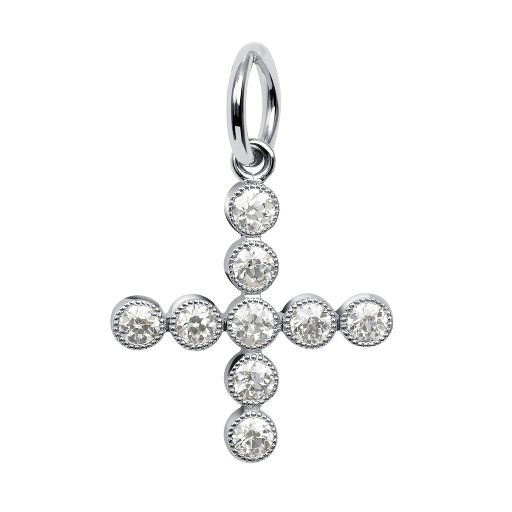 Single Stone's GABBY CROSS pendant  featuring Approximately 1.10ctw G-H/VS-SI old European cut diamonds in a handcrafted 18K gold bezel set cross charm. Cross measures 20.6mm x 20.6mm. Price does not include chain.  
