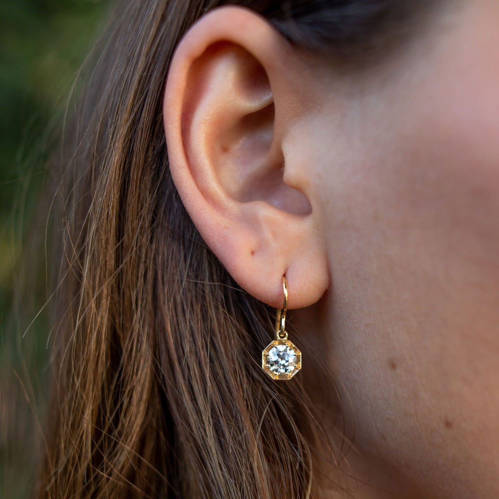 Single Stone's GEMMA DROPS earrings  featuring 1.88ctw K-L/VVS2-SI1 GIA certified old European&amp;nbsp;cut diamonds prong set in handcrafted 18K yellow gold drop earrings.
