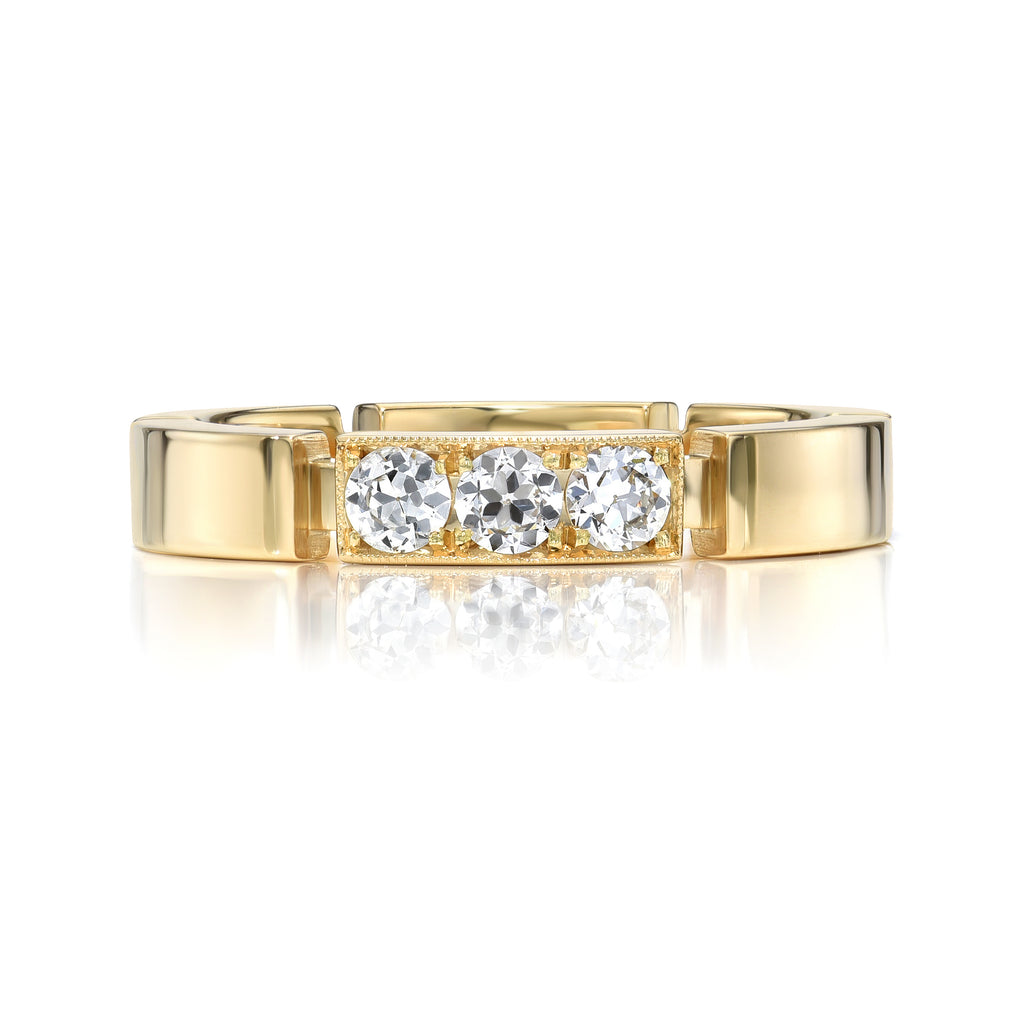 SINGLE STONE GIANA BAND | Approximately 0.85ctw G-H/VS Old European cut diamonds prong set in a handcrafted 18K yellow gold band. Approximate band width 3.5mm.