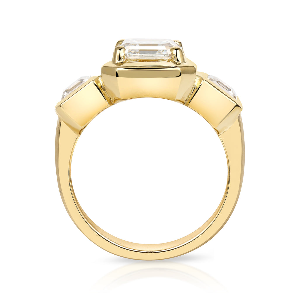 Single Stone's GLORIA ring  featuring 2.14ct K/VVS2 GIA certified Asscher diamond with 0.97ctw Asscher cut accent diamonds set in a handcrafted 18K yellow gold mounting.

