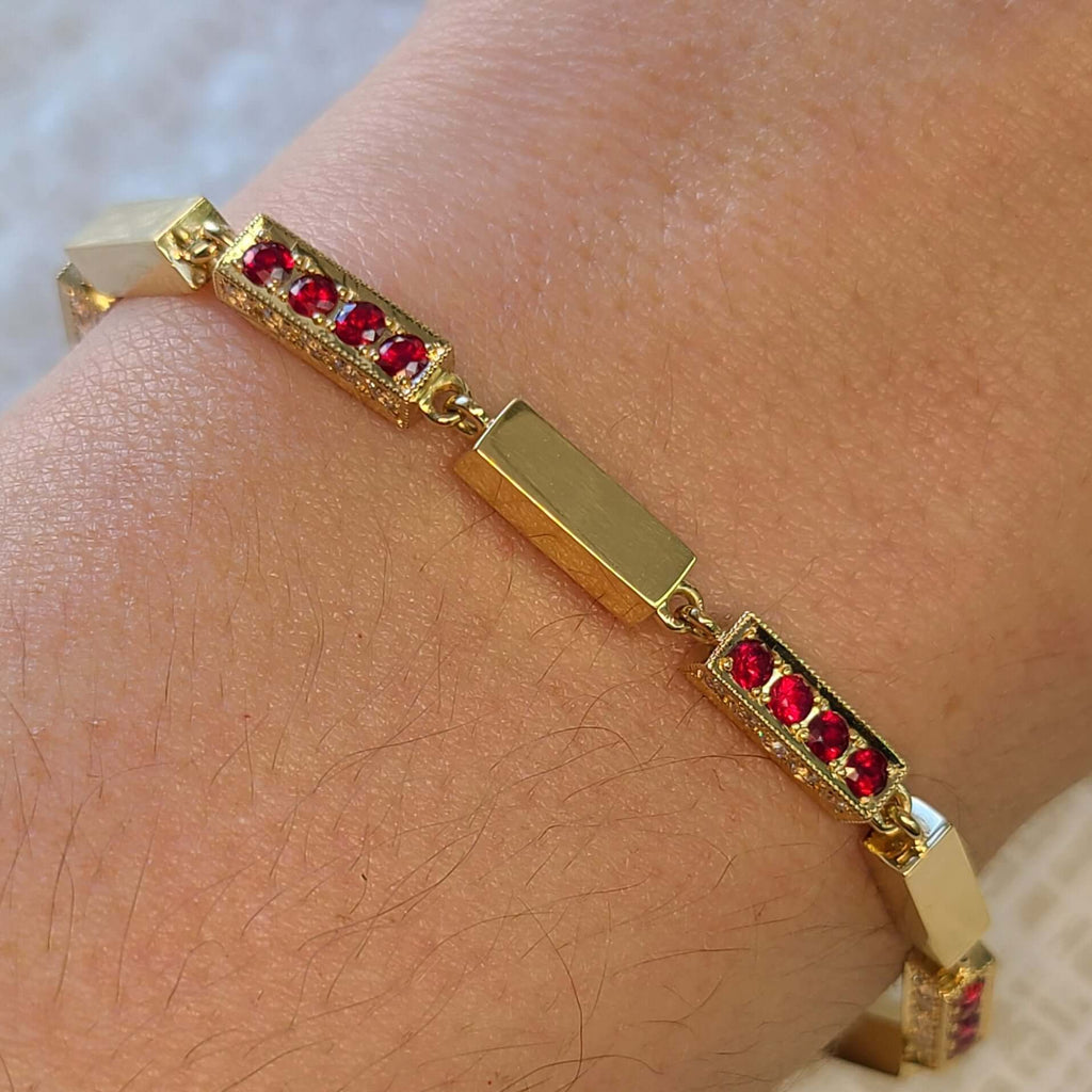 Single Stone's GIANA BRACELET WITH DIAMONDS AND GEMSTONES  featuring Approximately 1.25ctw G-H/VS old European cut diamonds with 2.75ctw round cut color gemstones set on a handcrafted 18K yellow gold full bar bracelet.  Bracelet measures 7.5&quot;
