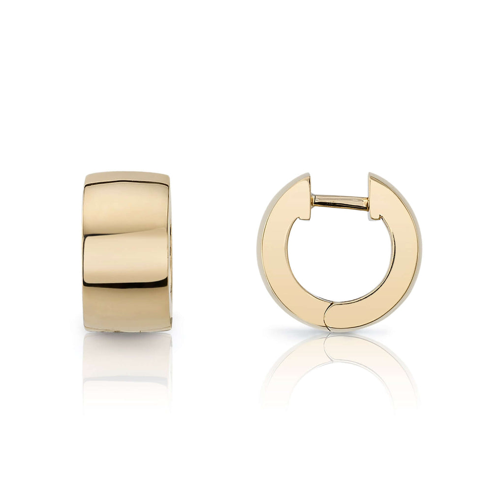 
Single Stone's Jenni huggies earrings  featuring Handcrafted high polished 18K yellow gold huggie hoop earrings.
