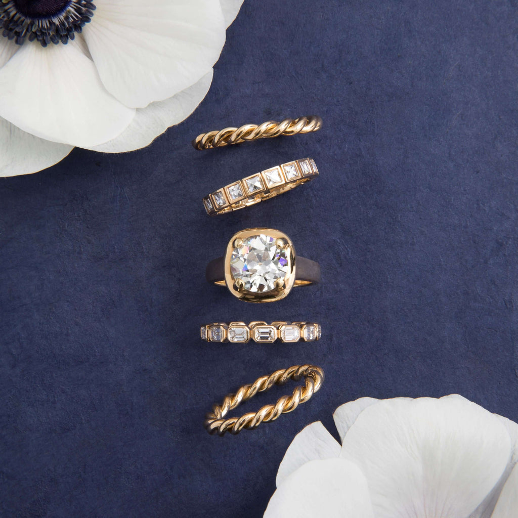 Single Stone's SMALL KARINA band  featuring Approximately 1.00ctw G-H/VS French cut diamonds bezel set in a handcrafted eternity band.  Approximate band width 2mm. Please inquire about additional customization.
